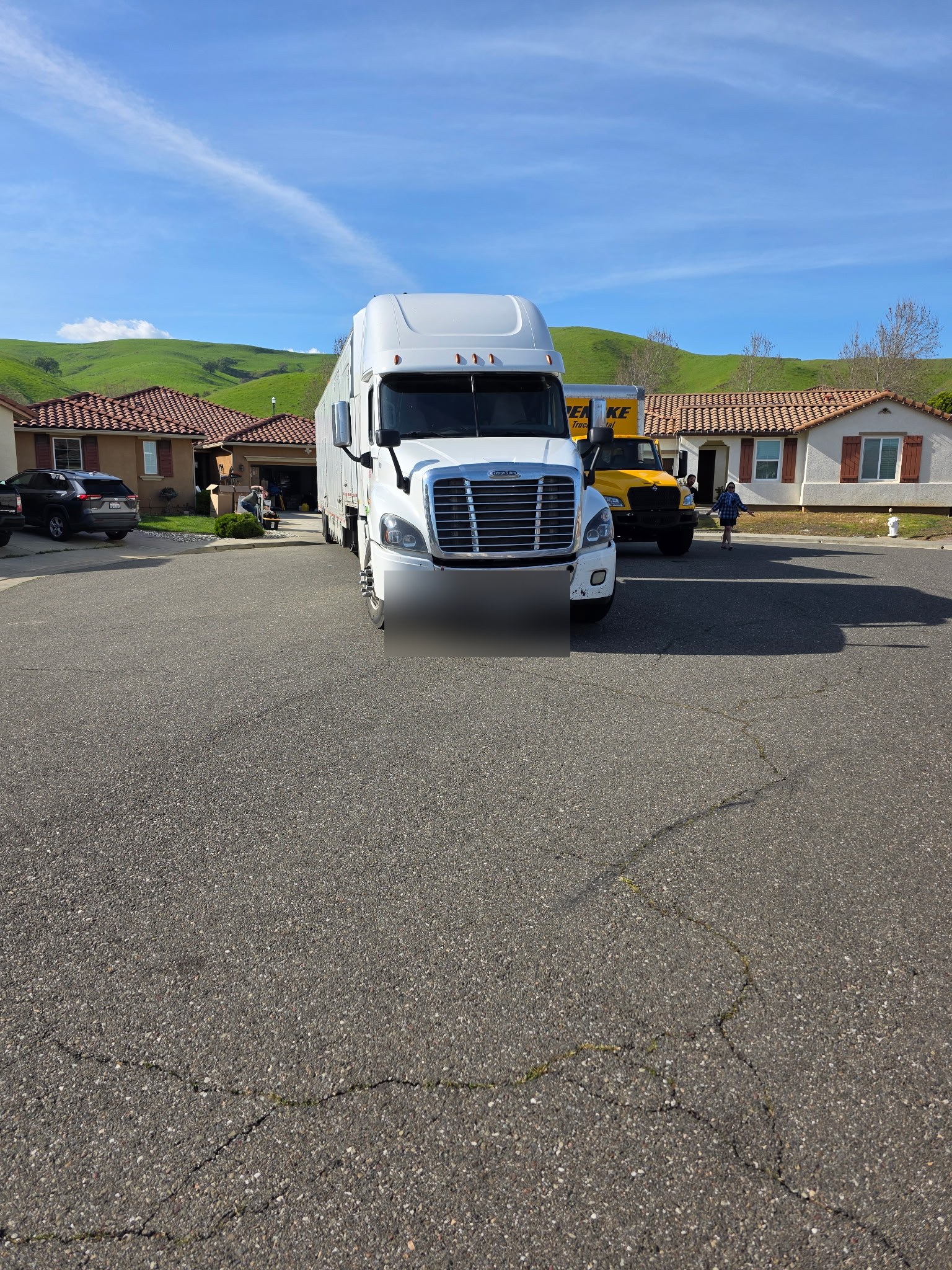 A Plus Moving and Storage truck arriving at a home in Montana